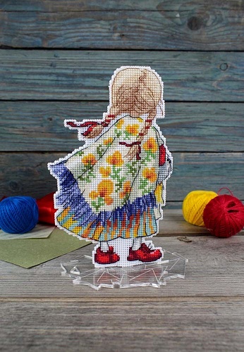 Девочка в красных башмачках