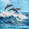 Дельфины над волной